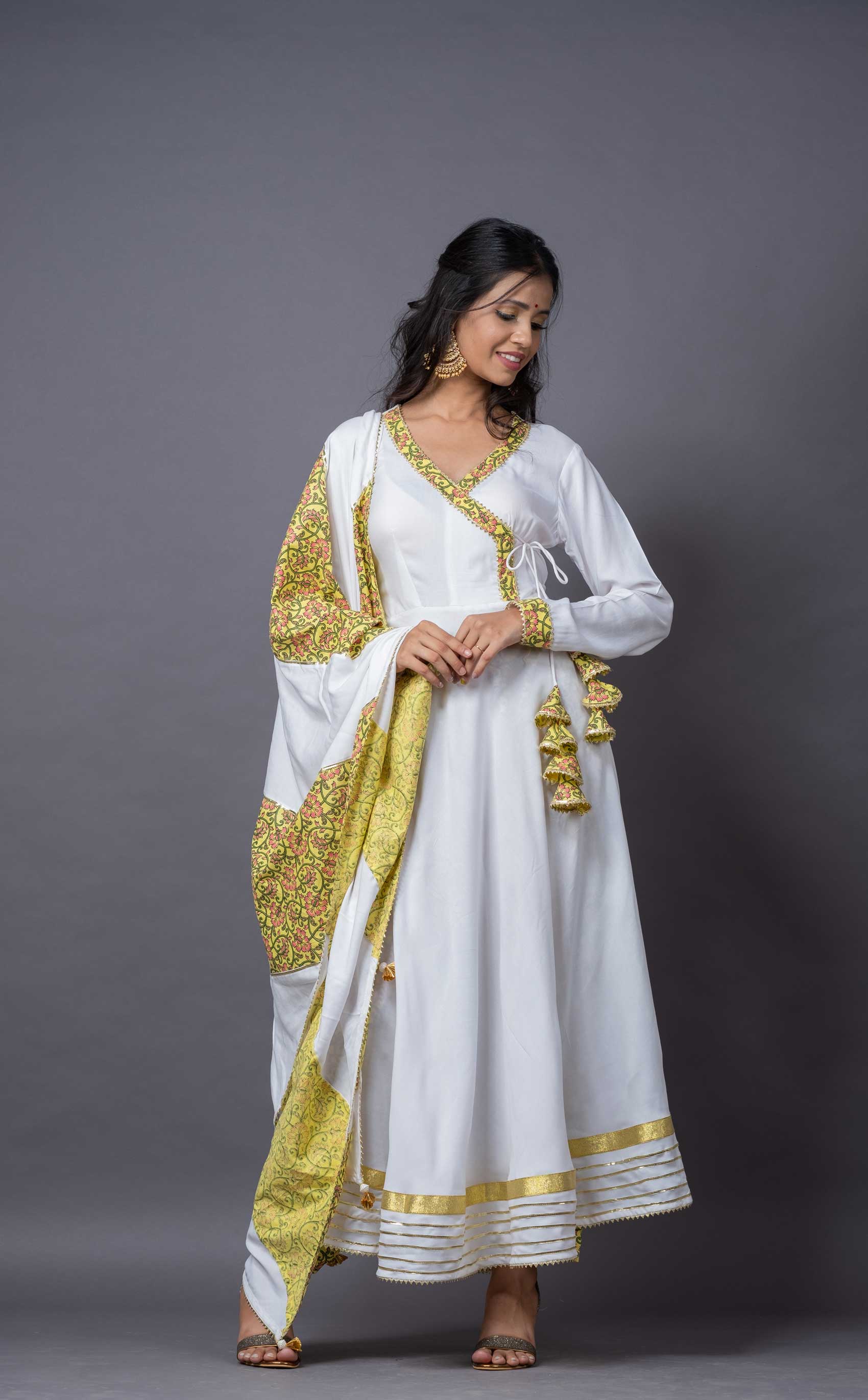 Arisha Dress  A white angrakha styled maxi dress with tassel detailing on  dori  Instagram